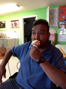 Customer Hugo Siete enjoys a Rompope (Spanish for an Eggnog-like drink) ice cream cone at Frozen Art Gourmet Ice Cream and Paletas. Photo: Jessie De La O